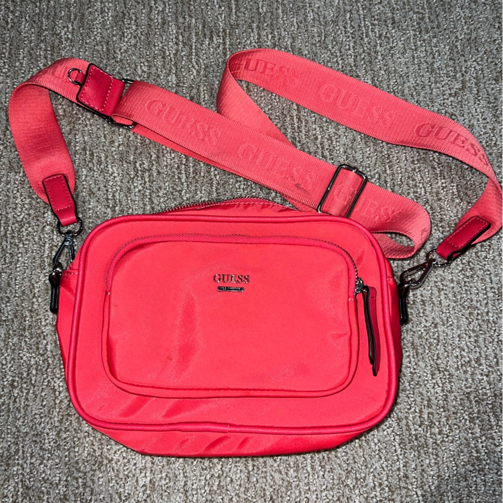 Neon pink GUESS crossbody purse